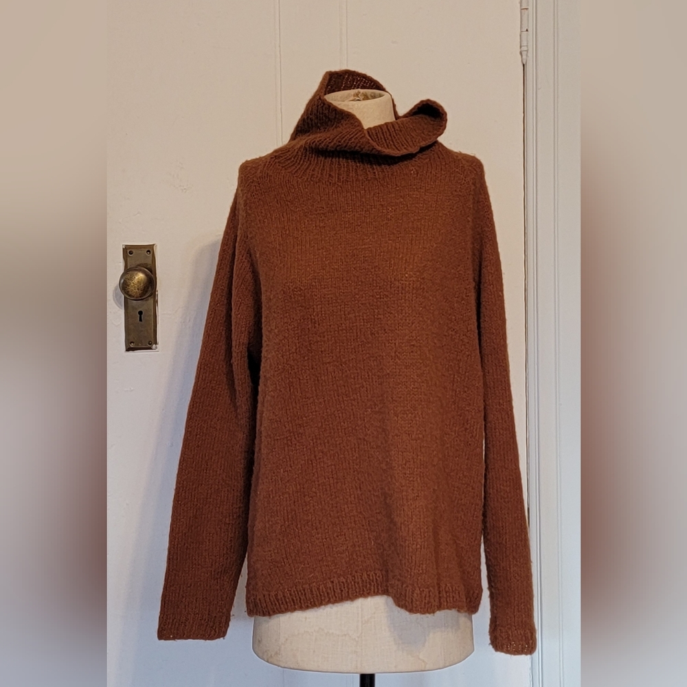 Vintage chocolate brown wool loose turtle neck sweater. Size medium / large.